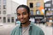 © ReeldealHD images - Portrait of young adult black male student on city street