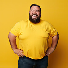 Excited Fat Man Celebrating Success. Happy Plus Size Bearded Man On Yellow Background