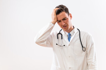 Wall Mural - Image of worried and tired doctor thinking.	