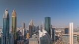 Fototapeta  - Skyline view of the high-rise buildings on Sheikh Zayed Road in Dubai aerial timelapse, UAE.