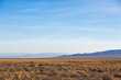Kazakhstan steppe landscape. Dry grass and mountains