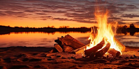 Beachside campfire at sunset outdoor lifestyle. Travel and holiday summer