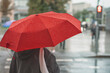 Leinwandbild Motiv Abstract girl under red umbrella, modern city, rainy evening