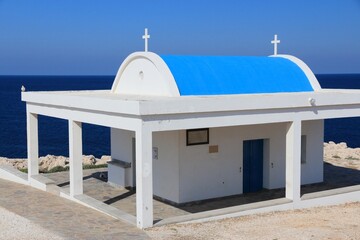 Poster - Cyprus blue white church. Cyprus - Mediterranean Sea coast. Agioi Anargyroi church at Cape Greco.