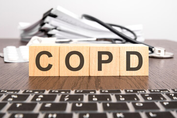 Poster - wooden cubes with text COPD. the medicine. medical concept