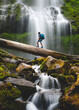 © Garrett Galván - Hiker at an Oregon Waterfall
