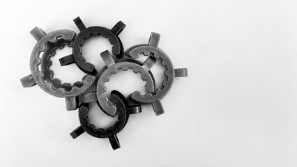  two gears set against a white background.