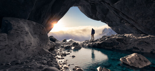 Wall Mural - adventurous man standing in cave on top of mountain. extreme adventure composite