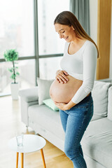 Wall Mural - pregnant woman portrait mother female pregnancy belly young beautiful maternity posing abdomen happy girl expecting motherhood happiness