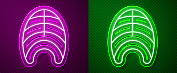 Wall Mural - Glowing neon line Fish steak icon isolated on purple and green background. Vector