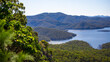 Panorama of advancetown lake and springbrook national park as seen from the top of pages pinnacle mountain ridge; hiking in the mountains near gold coast, queensland, australia	