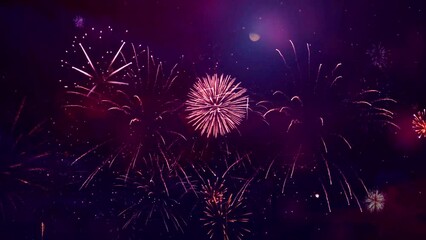 4K New year's eve fireworks celebration loop of real fireworks background. abstract golden shining glowing fireworks show. Real Fireworks display, New Year. national holiday, new year party or event