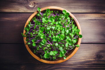 Canvas Print - Bowl with microgreens on wooden table, top view, Generative AI