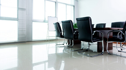 Empty conference room with table and chairs