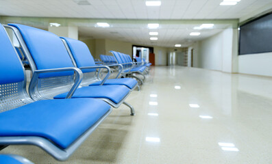 Canvas Print - Hospital waiting room with row of empty chairs