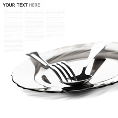 Close up of a silver spoon and fork on a white background (with sample text)