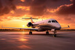 A powerful image showcasing a private jet parked on the tarmac at sunset. 
The vibrant colors of the setting sun reflected on the sleek surface of the aircraft exude an air of exclusivity and luxury.