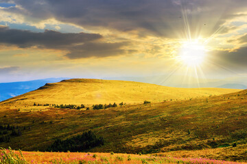 Wall Mural - uneven transitions on the slopes of high mountains at sunset. beautiful countryside scenery in eveni