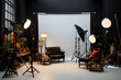 © Rekalawa - Photo studio with lighting equipment and a couch