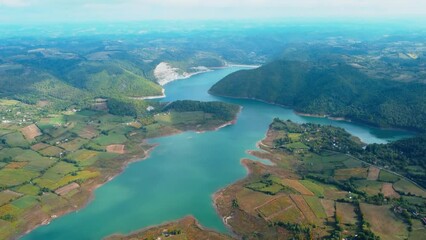 Wall Mural - Vew of countryside lake Rovni, Serbia and hilly landscape in autumn colors.