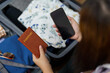 Woman packs baggage and passport in the suitcase prepared to travel new journey packing a luggage travel plans vacation.