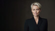 © Robert Kneschke - Confident woman in 40s, short blonde hair, business blazer