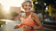 © banthita166 - seniorLatin woman. she's running outside on sunny day. solf light and bokeh style. she's 55 year old, beautiful eyes and healthy. she's smiling in Sport wear, smart watch and sunglasses.