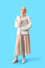 Poster - Arabian female programmer with laptop on blue background