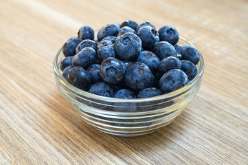 Wall Mural - Blueberries in a glass bowl