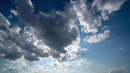 Wall Mural - blue sky white clouds. puffy fluffy white clouds. cumulus cloud cloudscape timelapse. summer blue sk