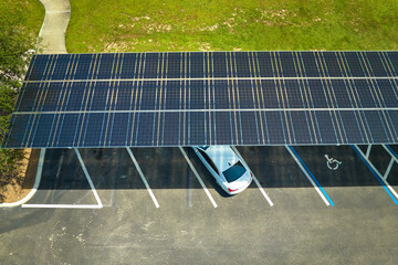 Wall Mural - Solar panels installed over parking lot for parked cars for effective generation of clean energy