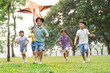 © Q88 - group image of cute asian children playing in the park