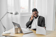 © SHOTPRIME STUDIO - african man laptop freelancer computer job education online american student person office