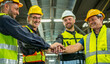 © BESTIMAGE - Group of colleague Engineer team join stack hand together with Spirit diversity solidarity power team in factory. foreman Join hand show oneness unity together teamwork friendship empower.