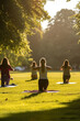 Group of people doing yoga or meditating in a city parc