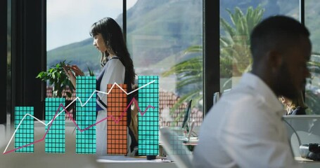 Canvas Print - Animation of statistical data processing against caucasian woman using digital tablet at office