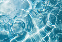 Clear Water In Swimming Pool With Ripple In Clean Aqua Liquid. Summer Wallpaper Blue Background And Reflection Of Sunlight On Water Surface.