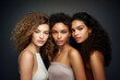 beauty portrait of 3 diverse young women of different hair and skin color