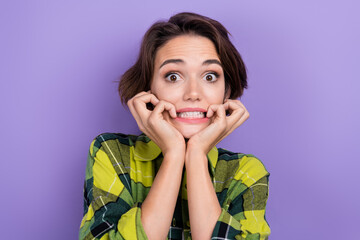 Sticker - Photo of young attractive woman biting fingers stress frightened nervous panic coward stay home alone isolated on violet color background