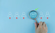 © Apichat - Businessman magnifying glass showing human resources virtual icon or HRM, focus manager icon, one of employee icons for leadership service, leading organization in recruiting and prospecting