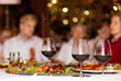 © Marco - wine glasses with background people talking defocused in a bar