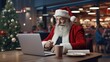 © MiguelAngel - Santa Claus working on the computer.