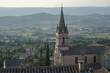 Close up of Saint-Gervais church in of old medieval town Bonnieux, Provence, France. Beautiful view of the valley with lavender fields and vineyards, card with copy space.