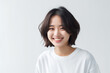 © Surachetsh - a lively Asian teen with short hair, donning a white T-shirt, standing against a clean white studio backdrop, beautifully lit. Perfect for a wide range of projects. generative AI.