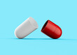 3d Red And White Open Pharmaceutical Antibiotic Capsule On Soft Blue Background, 3d Illustration