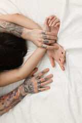 Wall Mural - passionate couple having sex on bed, top view