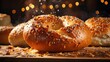 bagels bread with sprinkled sugar and sesame seeds on wooden table background blur