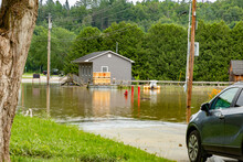 Coventry, Vermont, United States - July 12, 2023: A Flooded Road Is Seen In The Vermont Town Of Coventry Following Some Of The Worst Flooding In The State In Recent Memory
