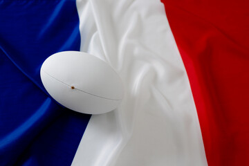 Poster - White rugby ball over flag of france