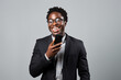 © AI_images - Black man with phone on studio background. AI Generated